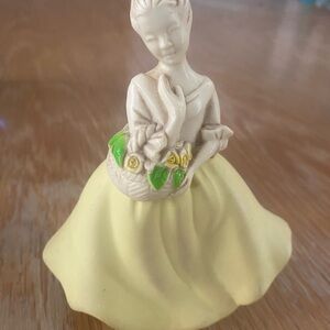 Avon Yellow Decorative Figurine